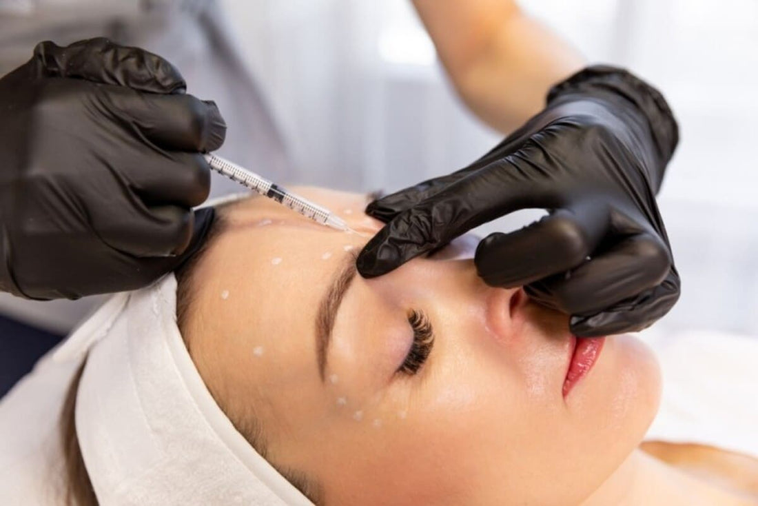 injectii cu botox pe fruntea pacientei